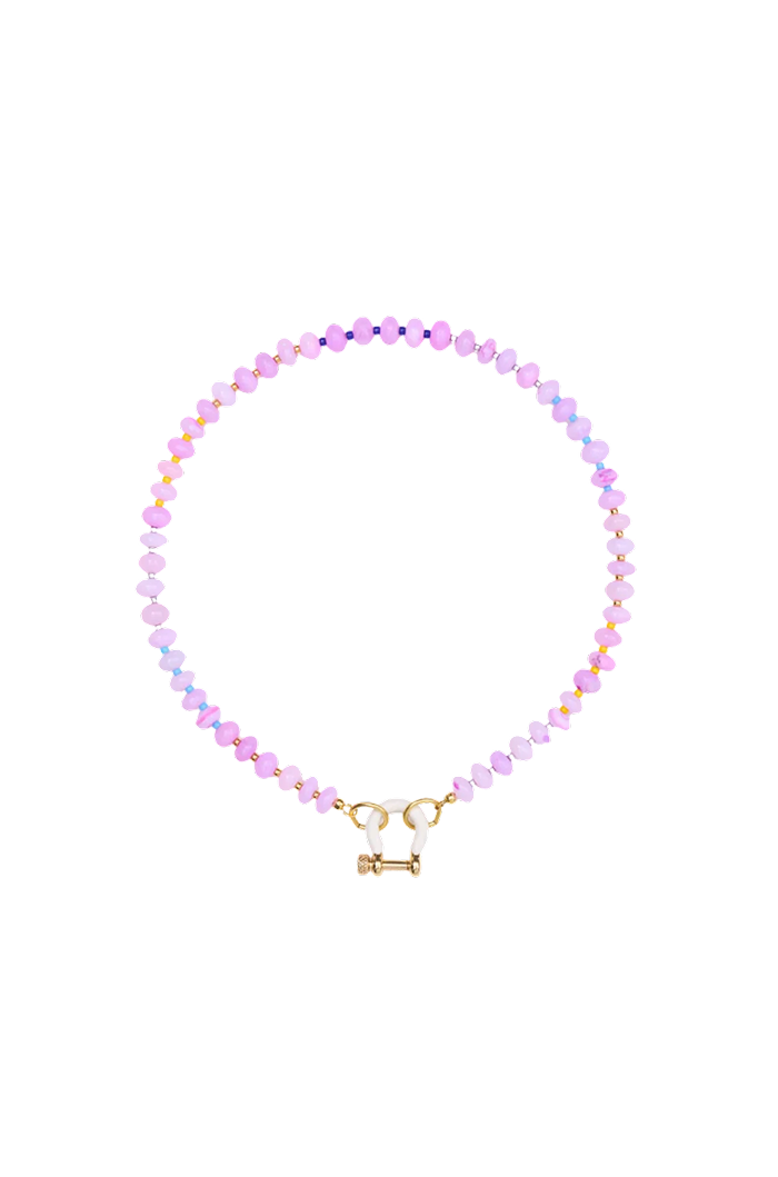 A delicate beaded necklace with small iridescent pink and lavender beads, featuring a gold-toned toggle clasp, displayed on a solid white background.
